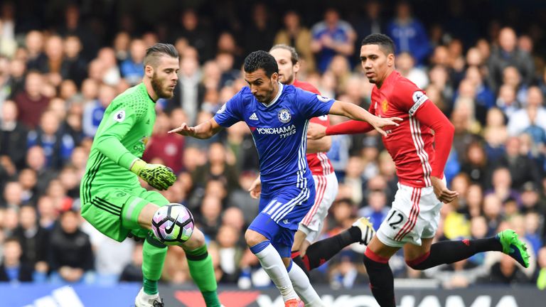 Pedro takes the ball beyond David de Gea to open the scoring at Stamford Bridge