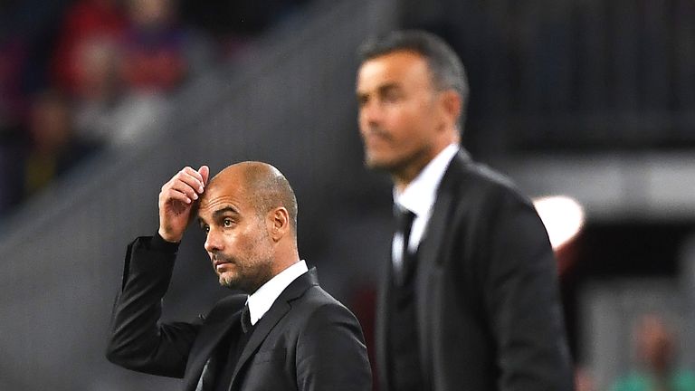 Pep Guardiola looks on from his technical area at Camp Nou