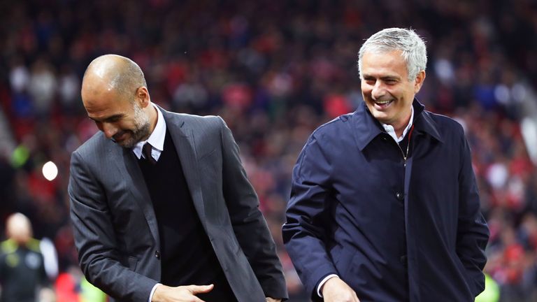 Pep Guardiola and Jose Mourinho share a joke prior to kick-off at Old Trafford
