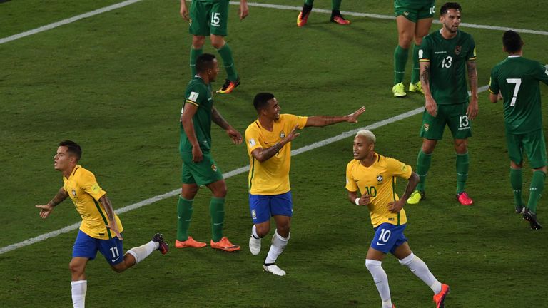 Brazil's Philippe Coutinho (L) celebrates his goal against Bolivia  during their Russia 2018 World Cup qualifier football match in Natal, Brazil, on Octobe