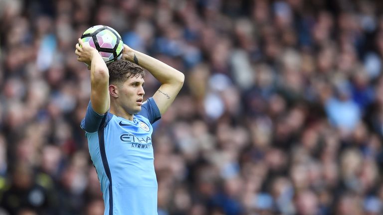 John Stones prepares to take a throw-in for Manchester City