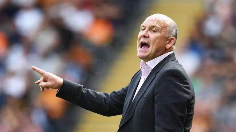 Hull City caretaker manager Mike Phelan gives his team instructions from the sideline