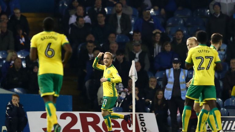 Alex Pritchard of Norwich (C) celebrates scoring his side's first goal during the EFL Cup fourth round match between Leeds and Norwich