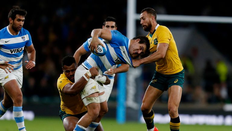 Australia's Quade Cooper and Dean Mumm and Argentina's Pablo Matera during the Rugby Championship match at Twickenham Stadium, London.