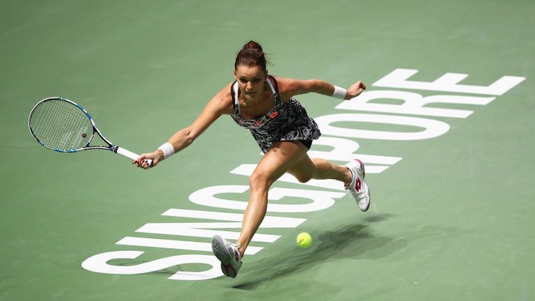 SINGAPORE - OCTOBER 26:  Agnieszka Radwanska of Poland plays a forehand in her singles match against Garbine Muguruza of Spain during day 4 of the BNP Pari
