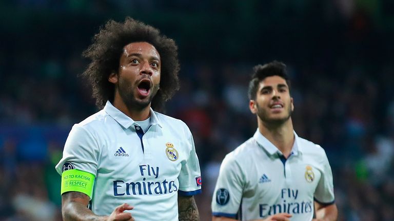 Marcelo (L) of Real Madrid celebrates after scoring