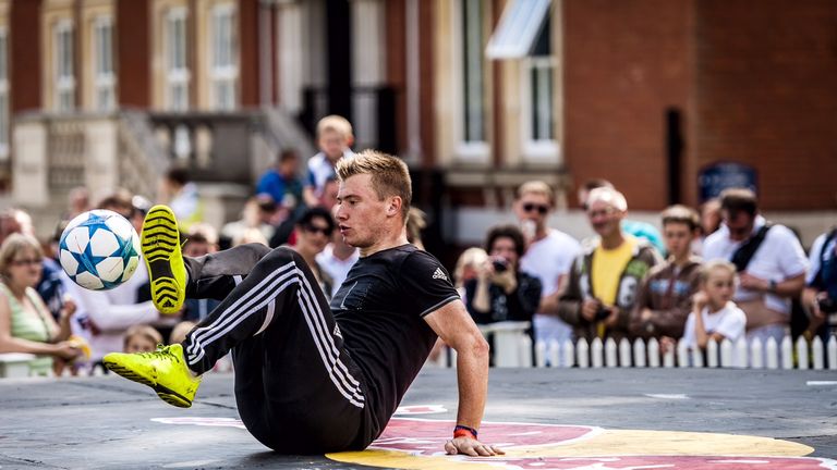 Freestyle soccer champion Andrew Henderson of Great Britain performs during a side act