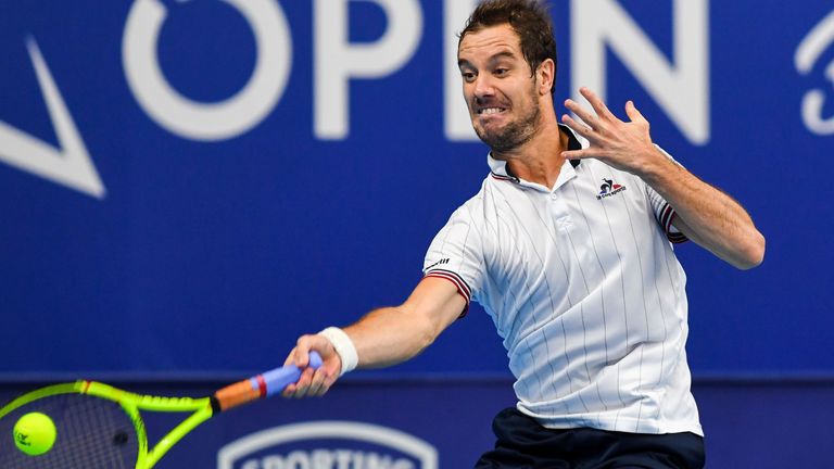 France's Richard Gasquet returns the ball to Britain's Kyle Edmund during their semi-final tennis match at the AFP European Open in Antwerp on October 22, 