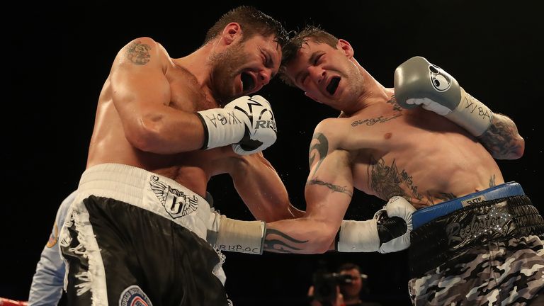 Ricky Burns (r) was given a tough night by Kiryl Relikh