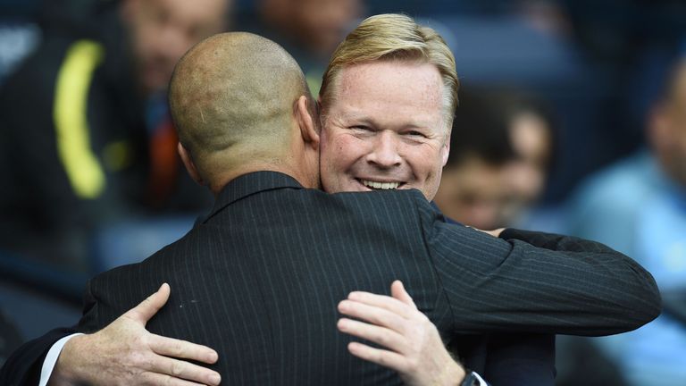 Everton manager Ronald Koeman greets Manchester City boss Pep Guardiola 