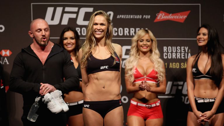 RIO DE JANEIRO, BRAZIL - JULY 31: UFC Strawweight Champion Ronda Rousey of the United States steps onto the scale during the UFC 190 Rousey v Correia weigh