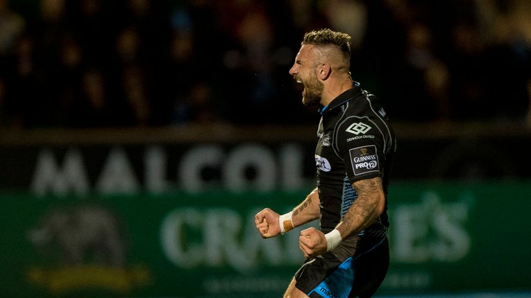 Rory Hughes celebrating one of his two tries 