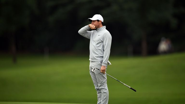 Rory McIlroy of Northern Ireland reacts after a shot during the third round of the World Golf Championships-HSBC Champions golf tournament in Shanghai on O