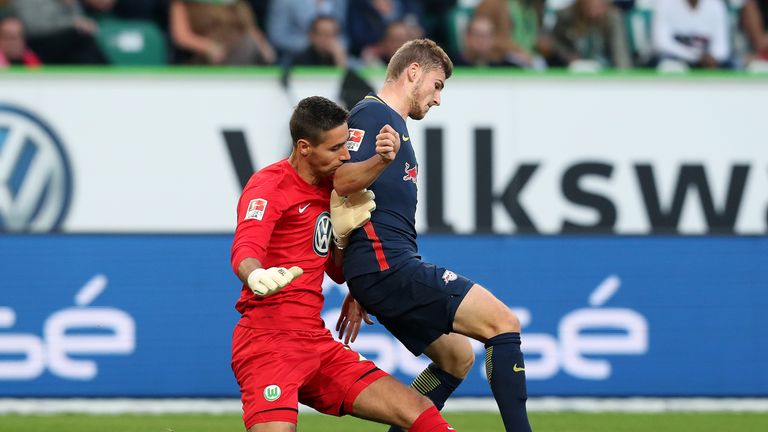 Leipzig's Timo Werner is fouled by Wolfsburg goalkeeper Koen Casteels 