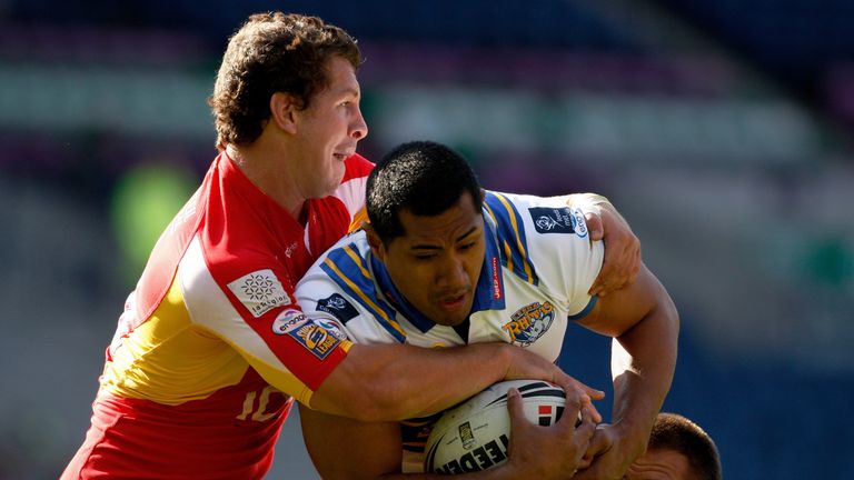 Bird (L) in Super League action for the Dragons in 2009 
