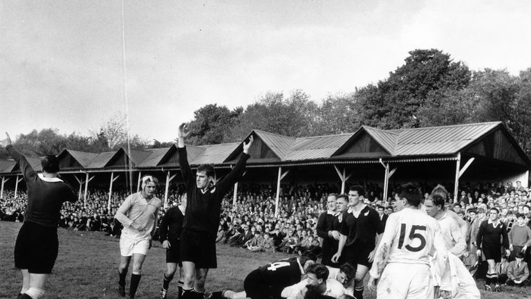 Colin Meads (middle) in action for the All Blacks in 1963