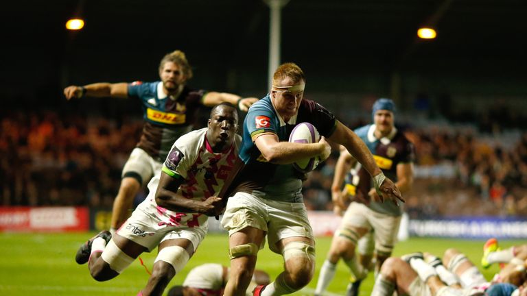James Chisholm breaks through to score Harlequins' fifth try against Stade Francais
