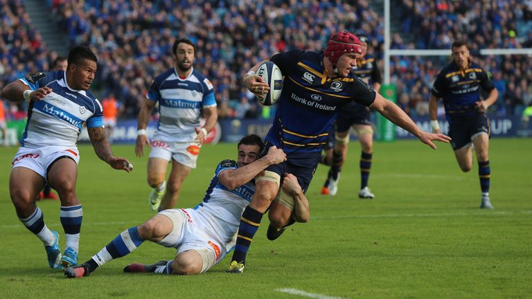 Josh van der Flier is brought down by Castres' Geoffrey Palis