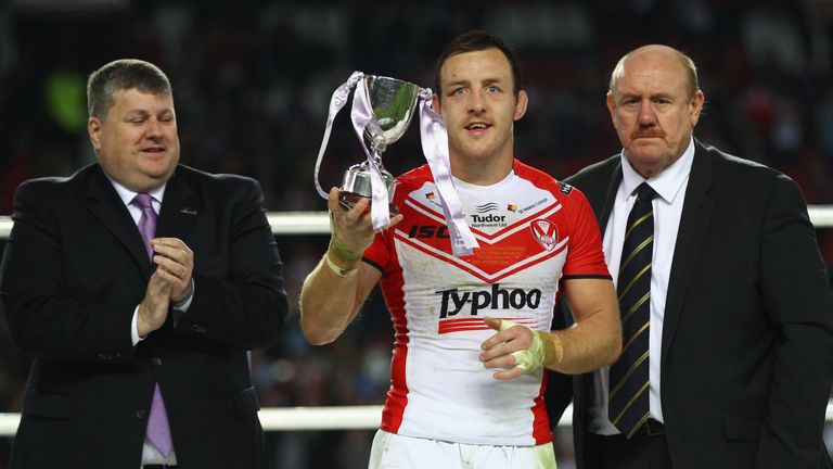 James Roby of St Helens receives the Harry Sunderland man of the match trophy after his sides 14-6 victory in 2014