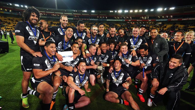 New Zealand players celebrate after winning the Four Nations Final Australia in 2014