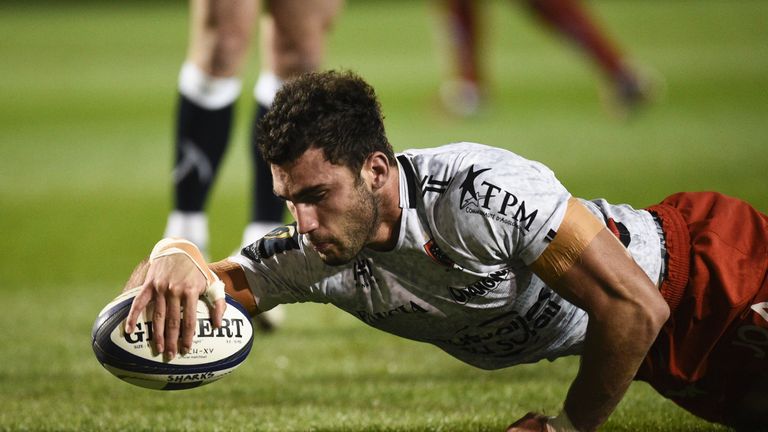 TOPSHOT - RC Toulon's French flanker Charles Ollivon scores a try during the European Rugby Champions Cup rugby union round 2 match between Sale Sharks and