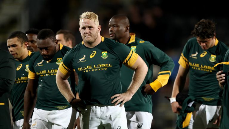 Vincent Koch (middle) looks dejected after the Springboks' loss to New Zealand