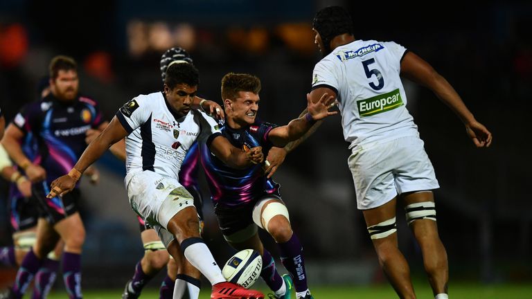  Wesley Fofana kicks under pressure from Henry Slade of Exeter