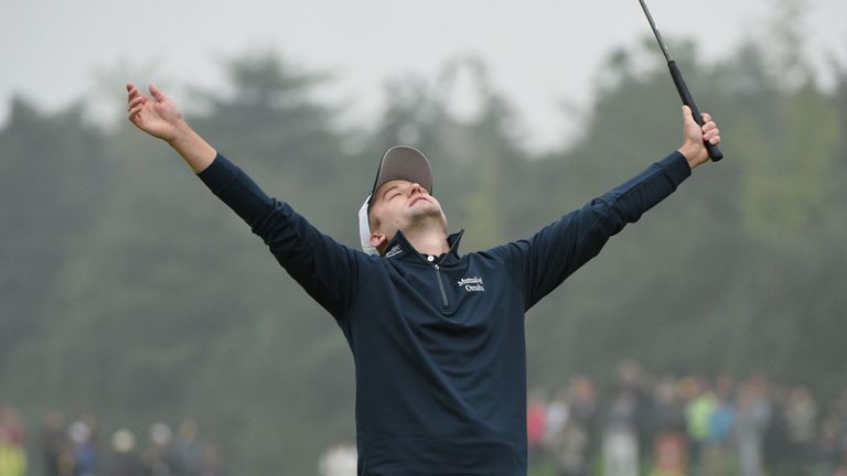 SHANGHAI, CHINA - NOVEMBER 08:  Russell Knox of Scotland celebrates winning the tournament on the 18th hole during the final round of the WGC - HSBC Champi
