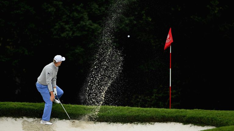 SHANGHAI, CHINA - OCTOBER 28:  Russell Knox of Scotland plays third shot on the par four third hole during the third round of the WGC - HSBC Champions at t