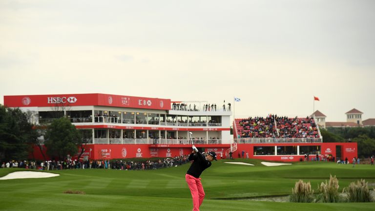SHANGHAI, CHINA - OCTOBER 29:  Russell Knox of Scotland hits his second shot on the 18th hole during day three of the WGC - HSBC Champions at Sheshan Inter