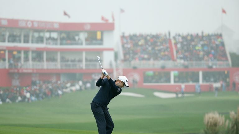 SHANGHAI, CHINA - NOVEMBER 08:  Russell Knox of Scotland hits his second shot on the 18th hole during the final round of the WGC - HSBC Champions at the Sh
