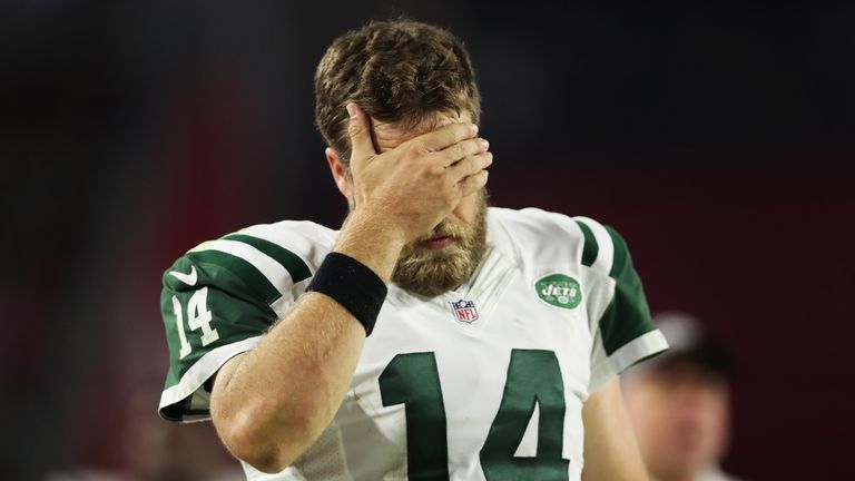 GLENDALE, AZ - OCTOBER 17:  Quarterback Ryan Fitzpatrick #14 of the New York Jets reacts in the second half of the NFL game against the Arizona Cardinals a