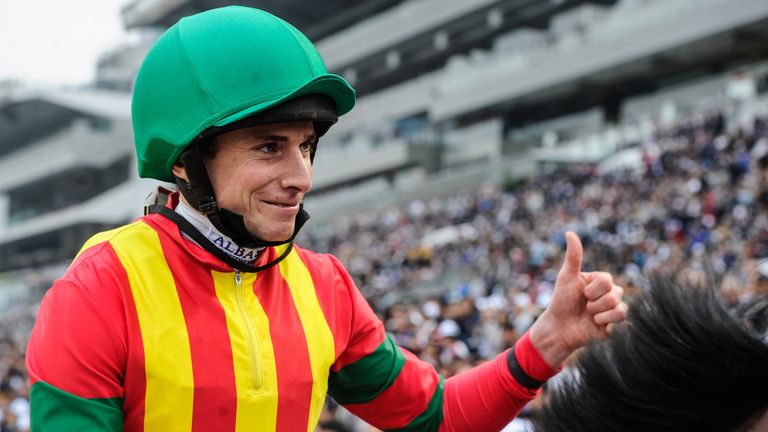 Jockey Ryan Moore gives a thumbs-up after riding Maurice to success in Japan.