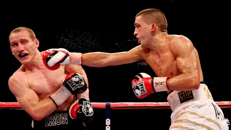 LONDON, ENGLAND - OCTOBER 05:  Lee Selby (R) in action with Ryan Walsh during their British and Commonwealth Featherweight Championship bout at O2 Arena on