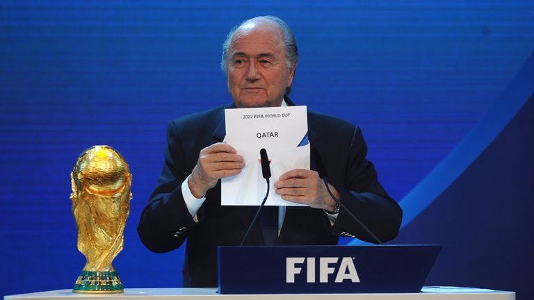 FIFA President Sepp Blatter names Qatar as the winning hosts of the 2022 World Cup finals 