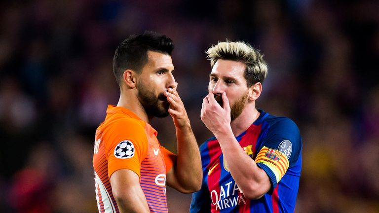 Sergio Aguero speaks to Lionel Messi during their Champions League match at Camp Nou