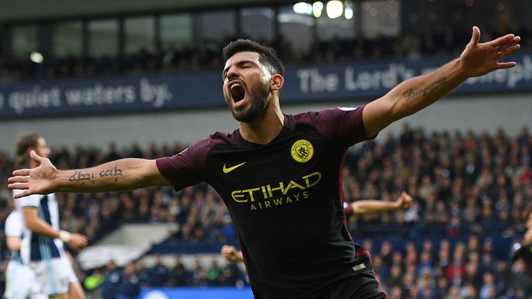 Manchester City's striker Sergio Aguero celebrates after scoring the opening goal