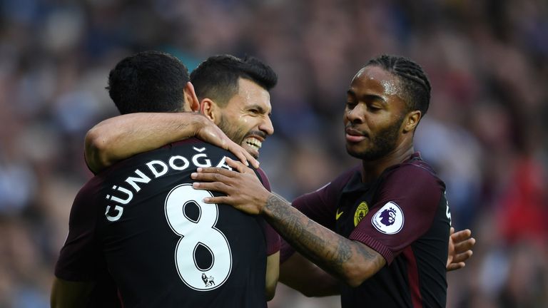 Sergio Aguero is congratulated after scoring for Man City