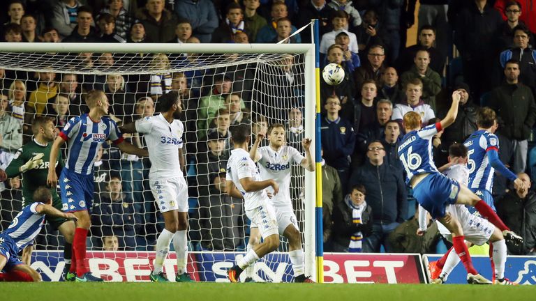 Wigan Athletic's Shaun MacDonald scores his sides first goal during the Sky Bet Championship match at Elland Road, Leeds.