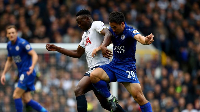 Victor Wanyama of Tottenham Hotspur and Shinji Okazaki of Leicester City compete for the ball