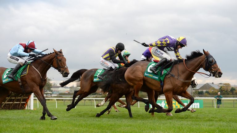 Silsol leads the field after two out in the Bet365 West Yorkshire Hurdle with Ballyoptic staying on.