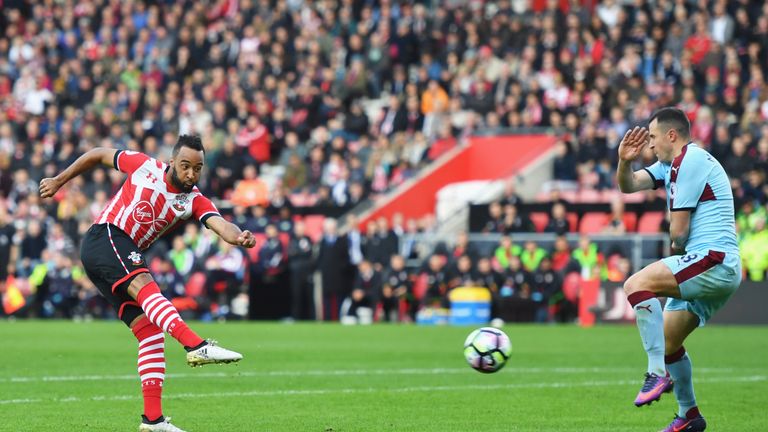 SOUTHAMPTON, ENGLAND - OCTOBER 16:  Nathan Redmond of Southampton shoots past Dean Marney of Burnley to score their second goal during the Premier League m