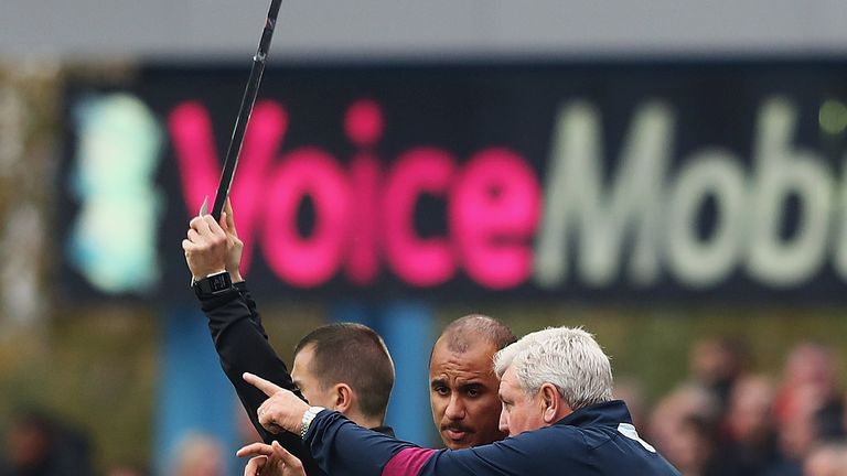 Steve Bruce, manager of Aston Villa talks to Gabriel Agbonlahor of Aston Villa, as he comes on as a substitute