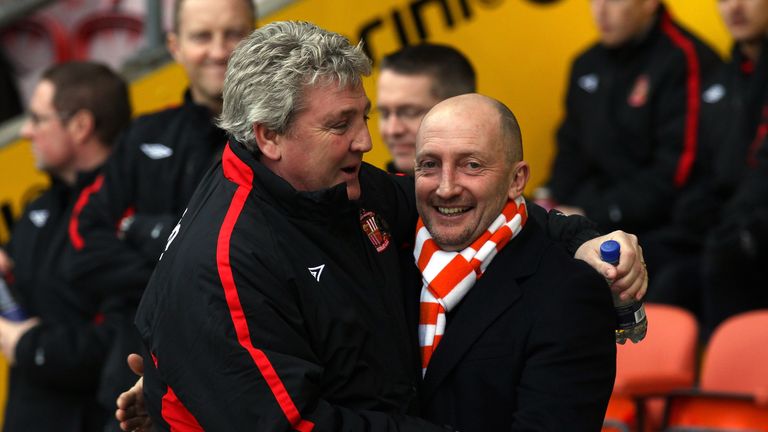 Ian Holloway and Steve Bruce embrace when managing in the Premier League