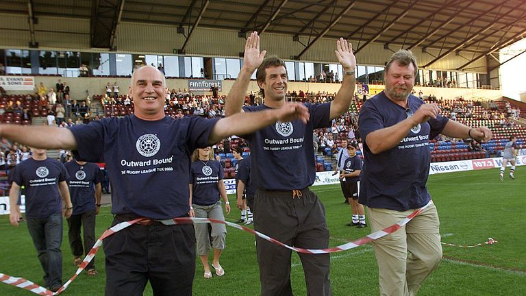 Dave Hadfield completes his Charity walk at Widnes with Mike Stephenson and Phil Clarke