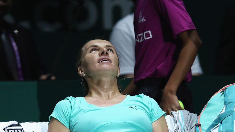 SINGAPORE - OCTOBER 24:  Svetlana Kuznetsova of Russia rests after victory in her singles match against Agnieszka Radwanska of Poland during the BNP Pariba