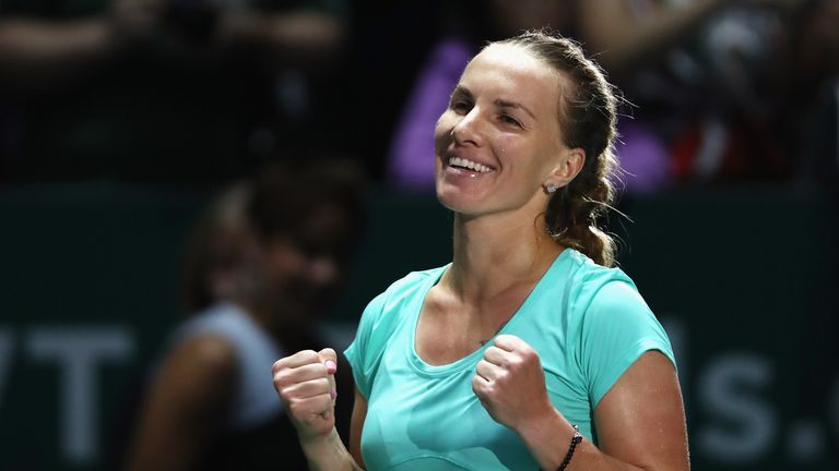 SINGAPORE - OCTOBER 24:  Svetlana Kuznetsova of Russia celebrates victory after her singles match against Agnieszka Radwanska of Poland during the BNP Pari