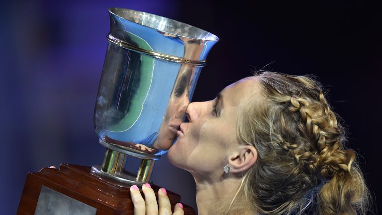 Russia's Svetlana Kuznetsova celebrates with her trophy after defeating Australia's Daria Gavrilova during the Kremlin Cup tennis tournament final match in