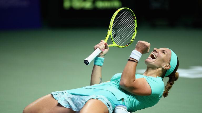 SINGAPORE - OCTOBER 26:  Svetlana Kuznetsova of Russia celebrates victory in her singles match against Karolina Pliskova of Czech Republic during day 4 of 