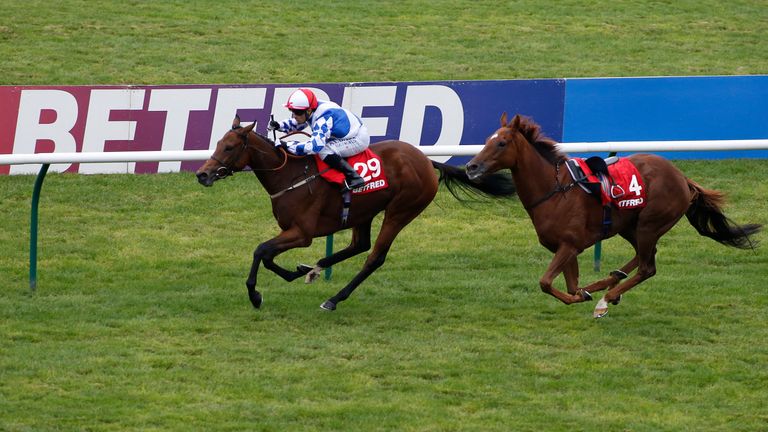 Silvestre De Sousa riding Sweet Selection win the Betfred Cesarewitch at Newmarket 